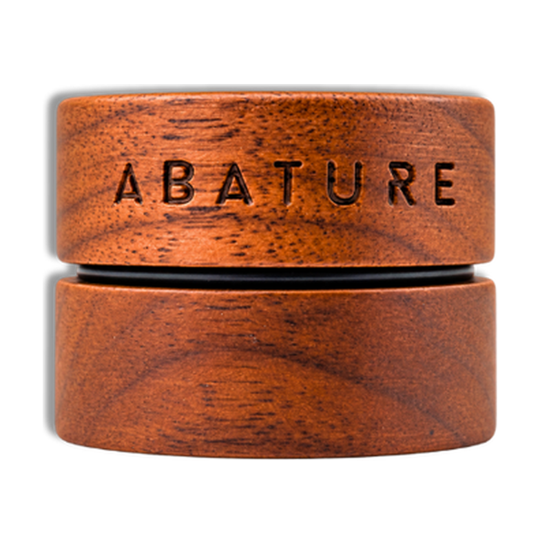 Abature Champagne Lip Butter in a wooden jar