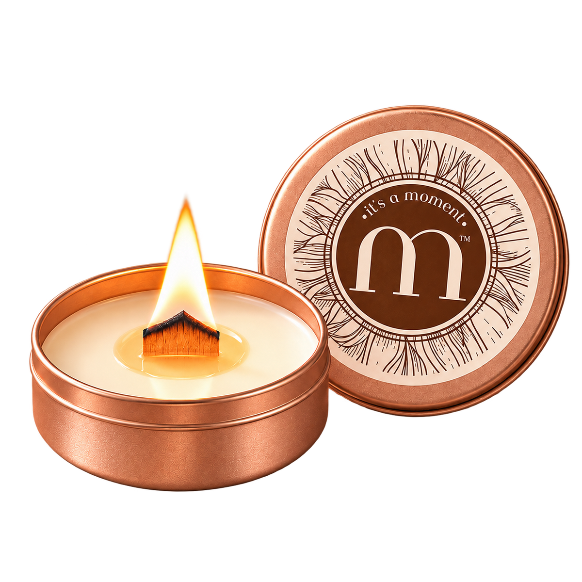 Moment 2 oz signature scent candle, lit, in a rose gold tin