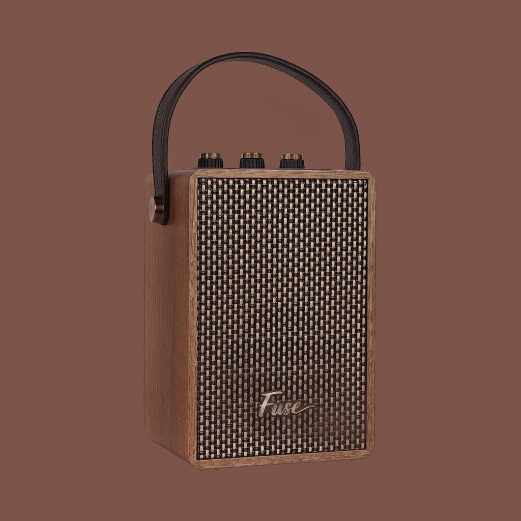 Fuse retro Bluetooth speaker in brown wood veneer with a vegan leather handle, view 2