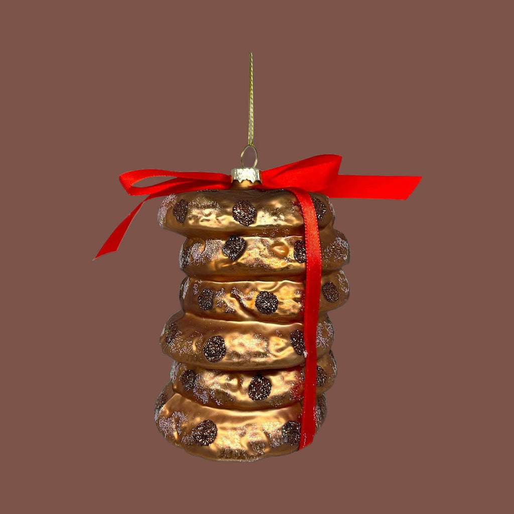 Glass ornament shaped like a stack of chocolate chip cookies tied with a red bow, view 2