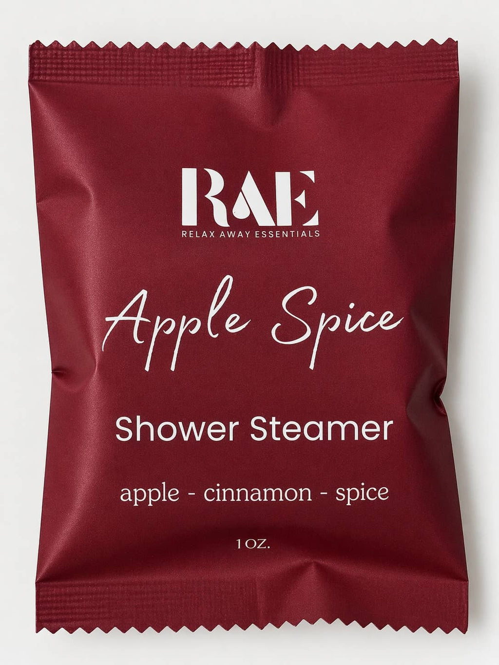 RAE Apple Spice shower steamer in a red pouch, view 2